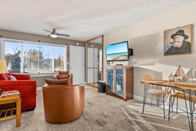 Step into coastal living at its finest with this inviting first