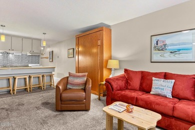 Step into coastal living at its finest with this inviting first