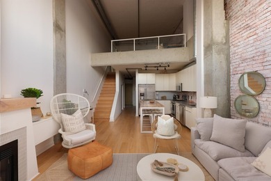 This two-level, 1 bedroom (potential for 2) Gastown loft sits on - photo 12