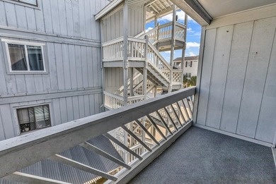 Perfectly positioned just across the street from the sandy - photo 33