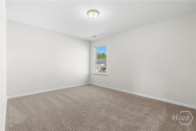 The Hatteras floorplan by Smith Family Homes is under - photo 11