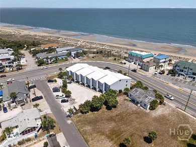 Turn-key coastal living just steps from the sand! This fully - photo 34