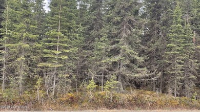Nicely treed 0.46 acre lot with year-round road maintenance - photo 4