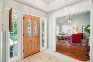 Set on nearly a quarter-acre in a highly sought-after, guarded