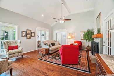 Set on nearly a quarter-acre in a highly sought-after, guarded