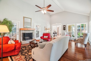 Set on nearly a quarter-acre in a highly sought-after, guarded