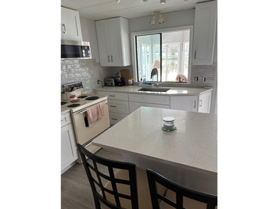 THIS TWO BEDROOM TWO BATH HOME WITH ADDITIONAL THIRD - photo 5