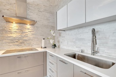 SPECTACULAR UNIT WITH DIRECT BAY VIEWS OF BISCAYNE BAY. 2 BED, 2