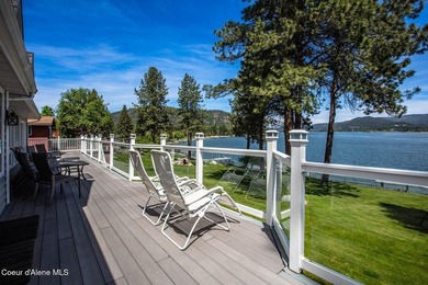 Timeless waterfront retreat with soaring cathedral ceilings, an - photo 4