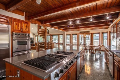Timeless waterfront retreat with soaring cathedral ceilings, an - photo 8