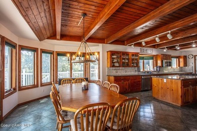 Timeless waterfront retreat with soaring cathedral ceilings, an - photo 10