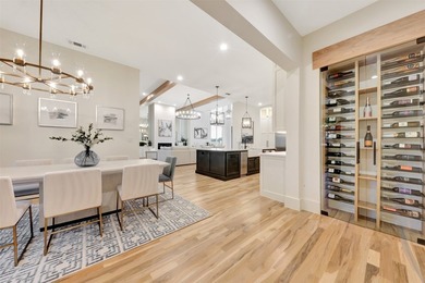 Luxury custom home in Heath, TX with soaring ceilings, walls of - photo 11