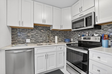 Beautifully RENOVATED 2nd floor CORNER condo in Century Village - photo 13