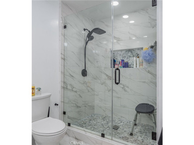 Welcome to this beautifully renovated first-level condominium in - photo 18