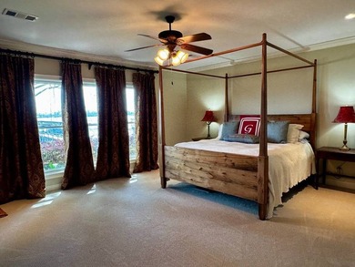 This 2006 custom built Lakehouse boast high ceilings 3 bedrooms - photo 19