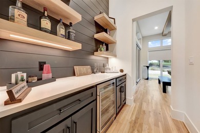 Luxury custom home in Heath, TX with soaring ceilings, walls of - photo 20