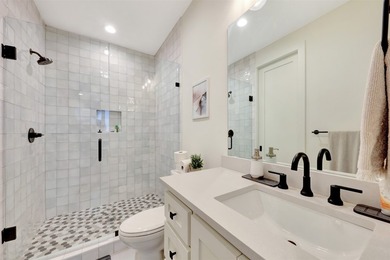 Luxury custom home in Heath, TX with soaring ceilings, walls of - photo 22
