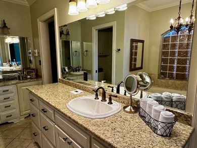 This 2006 custom built Lakehouse boast high ceilings 3 bedrooms - photo 24