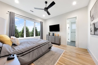 Luxury custom home in Heath, TX with soaring ceilings, walls of - photo 25