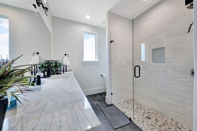 Luxury custom home in Heath, TX with soaring ceilings, walls of - photo 26