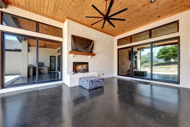 Luxury custom home in Heath, TX with soaring ceilings, walls of - photo 29