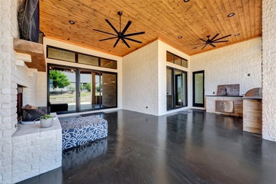 Luxury custom home in Heath, TX with soaring ceilings, walls of - photo 30