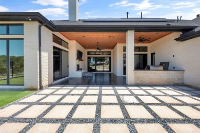 Luxury custom home in Heath, TX with soaring ceilings, walls of - photo 31