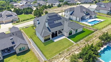 Luxury custom home in Heath, TX with soaring ceilings, walls of - photo 34