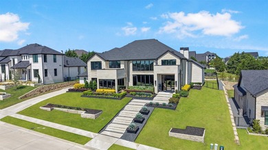 Luxury custom home in Heath, TX with soaring ceilings, walls of - photo 35