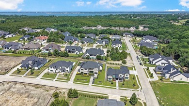 Luxury custom home in Heath, TX with soaring ceilings, walls of - photo 36