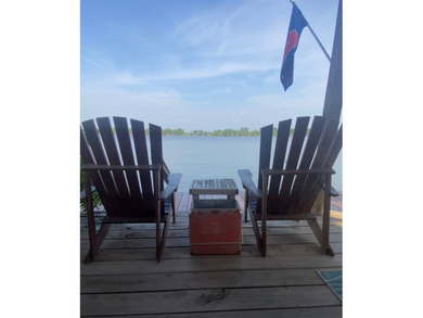 This 2006 custom built Lakehouse boast high ceilings 3 bedrooms - photo 58