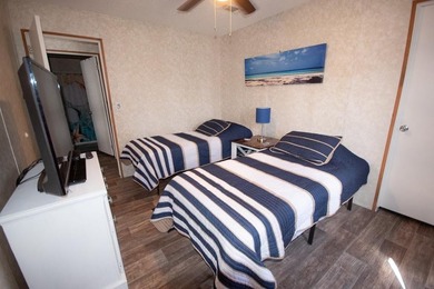 *NO FLOOD ZONE * Welcome to this turnkey coastal retreat nestled - photo 11