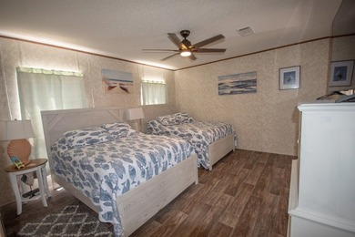 *NO FLOOD ZONE * Welcome to this turnkey coastal retreat nestled - photo 13