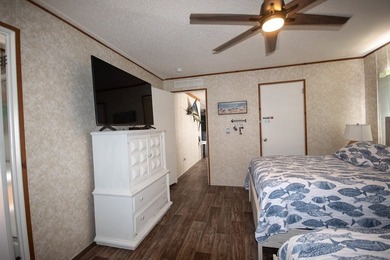 *NO FLOOD ZONE * Welcome to this turnkey coastal retreat nestled - photo 16