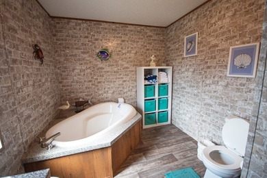 *NO FLOOD ZONE * Welcome to this turnkey coastal retreat nestled - photo 18