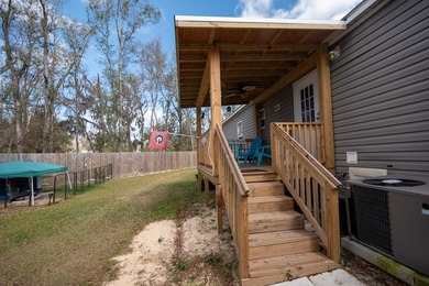 *NO FLOOD ZONE * Welcome to this turnkey coastal retreat nestled - photo 20