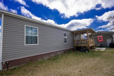 *NO FLOOD ZONE * Welcome to this turnkey coastal retreat nestled - photo 21