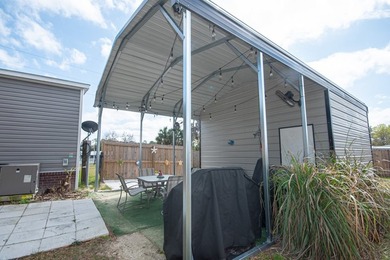 *NO FLOOD ZONE * Welcome to this turnkey coastal retreat nestled - photo 22
