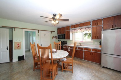 Bring your Chickens, Horses and Cows to this 5.72 acre Farmette! - photo 4
