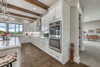 Luxury, craftsmanship, and mountain-view living converge at this - photo 38