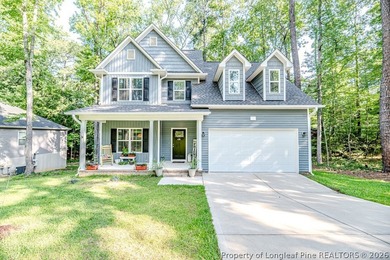 In the highly sought-after gated community of Carolina Trace! - photo 1