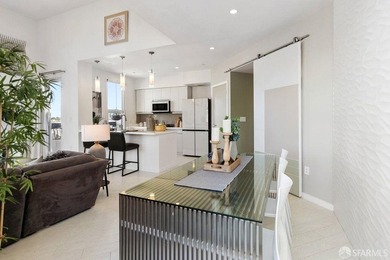 Experience modern, loft-like living in this unique top-floor - photo 11