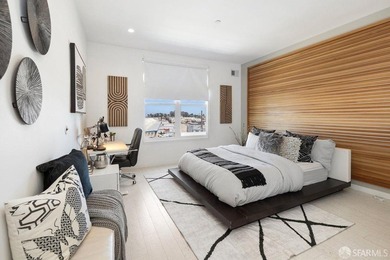 Experience modern, loft-like living in this unique top-floor - photo 14
