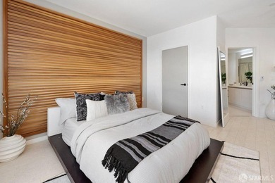 Experience modern, loft-like living in this unique top-floor - photo 16