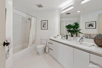 Experience modern, loft-like living in this unique top-floor - photo 17