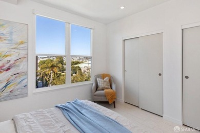 Experience modern, loft-like living in this unique top-floor - photo 19