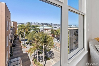 Experience modern, loft-like living in this unique top-floor - photo 21