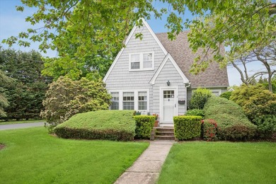 Tucked away on a desirable village street, this circa-1927 home - photo 1
