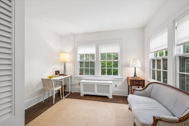 Tucked away on a desirable village street, this circa-1927 home - photo 5