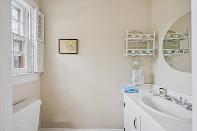 Tucked away on a desirable village street, this circa-1927 home - photo 6